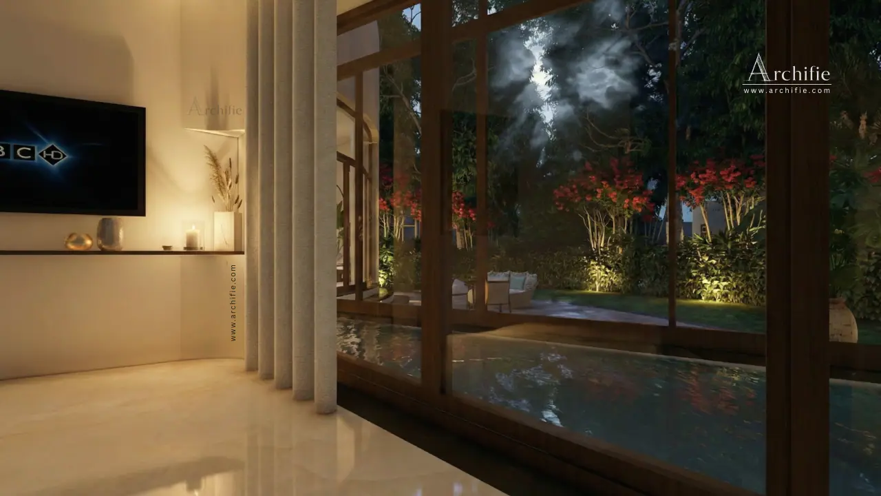 An indoor pool opening onto the jungle